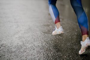 Close-up of a runner wearing performance activewear fabric